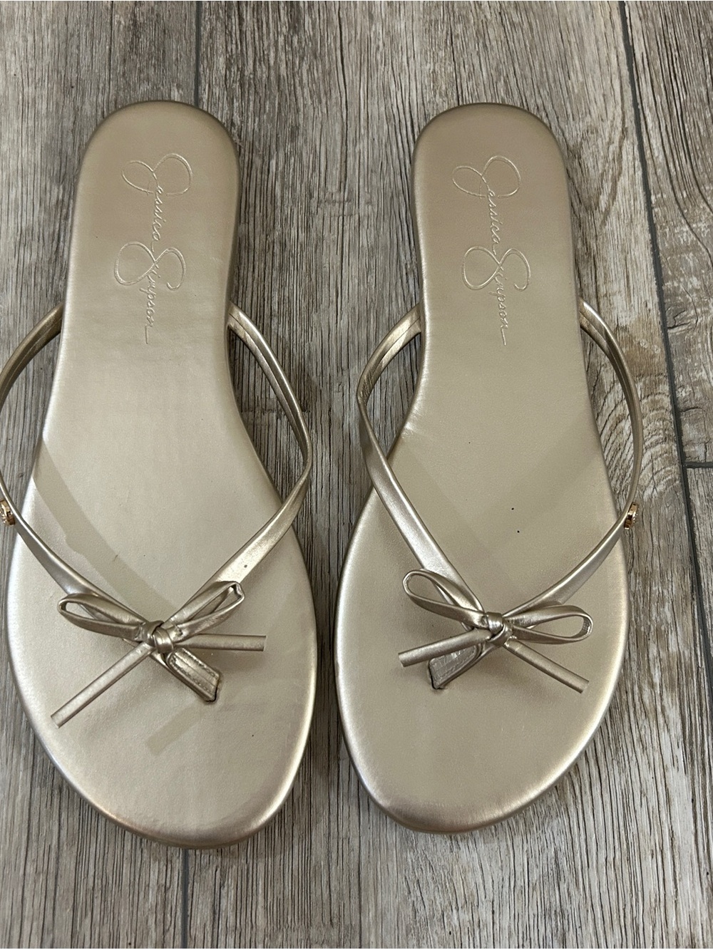 Jessica Simpson Size 10 Metallic Gold Bow Flip Flops